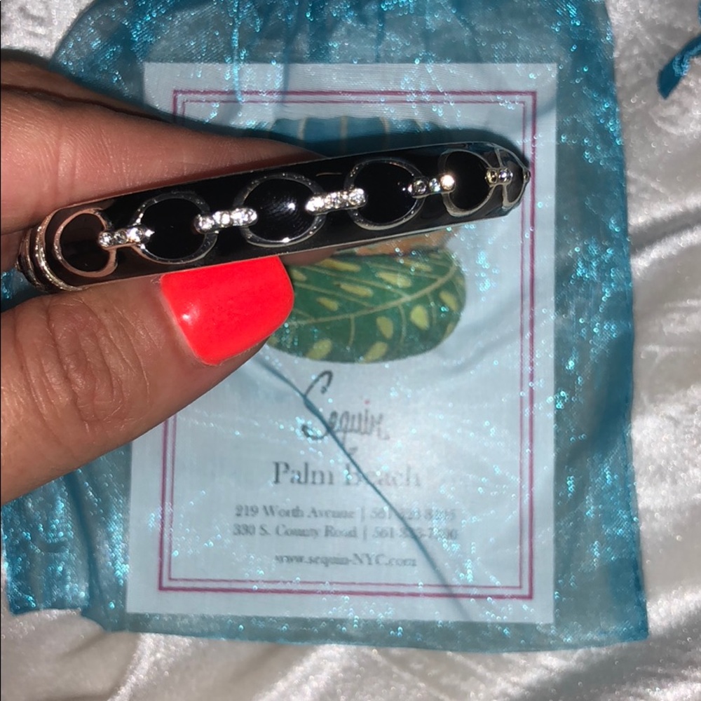 Silver and black  bracelet with diamond details
